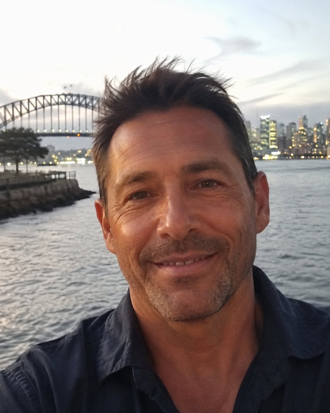 Illustrative lifestyle image of a man by the water